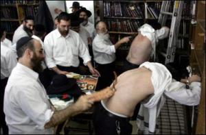 Men flog each other with leather whips on the eve of Kippur, usually in synagogue